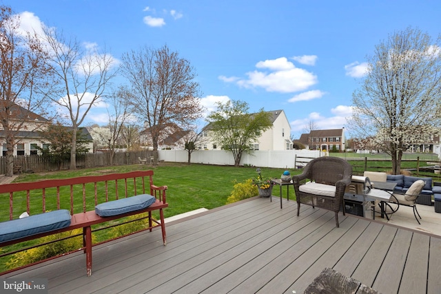deck with a residential view and an outdoor living space