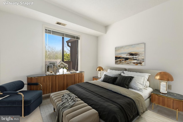 bedroom featuring carpet