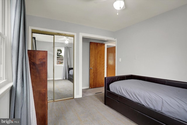5021 Utah Ave, Harrisburg, PA 17109 - bedroom with carpet flooring, a closet, a ceiling fan, and baseboards