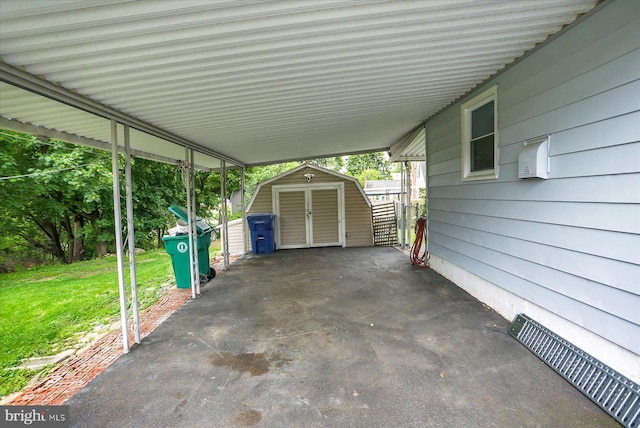 5021 Utah Ave, Harrisburg, PA 17109 - view of car parking featuring a storage unit and a carport