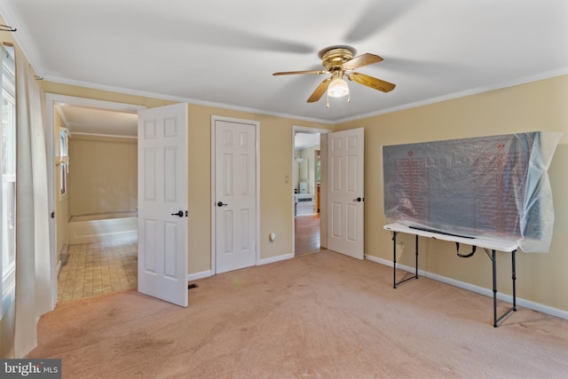 256 Frontier Trl, Lusby, MD 20657 - unfurnished bedroom featuring carpet floors, baseboards, ornamental molding, and a ceiling fan