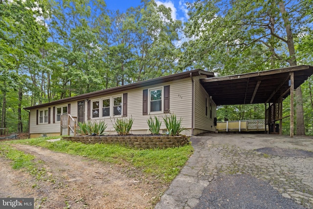 256 Frontier Trl, Lusby, MD 20657 - view of front facade with driveway and an attached carport