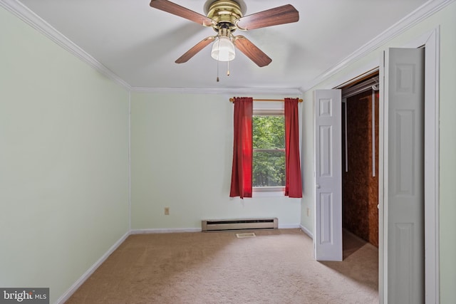 256 Frontier Trl, Lusby, MD 20657 - spare room with crown molding, carpet, ceiling fan, baseboards, and baseboard heating