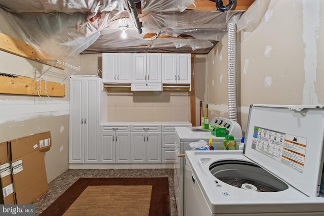 256 Frontier Trl, Lusby, MD 20657 - laundry room with cabinet space and separate washer and dryer