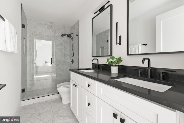 bathroom with toilet, a marble finish shower, marble finish floor, and a sink