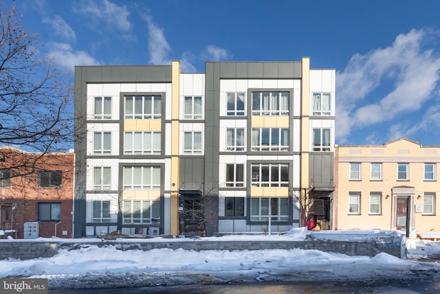 view of snow covered building