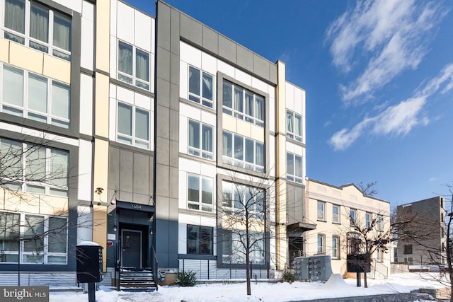 view of snow covered building