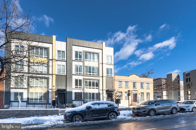 view of snow covered building