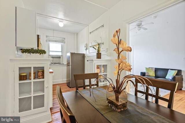1954 Columbia Rd NW Unit 504, Washington, DC 20009 - dining space featuring wood finished floors, a ceiling fan, and cooling unit