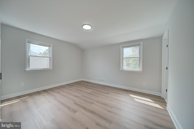 6802 Elbrook Rd, Lanham, MD 20706 - spare room featuring visible vents, a healthy amount of sunlight, and wood finished floors