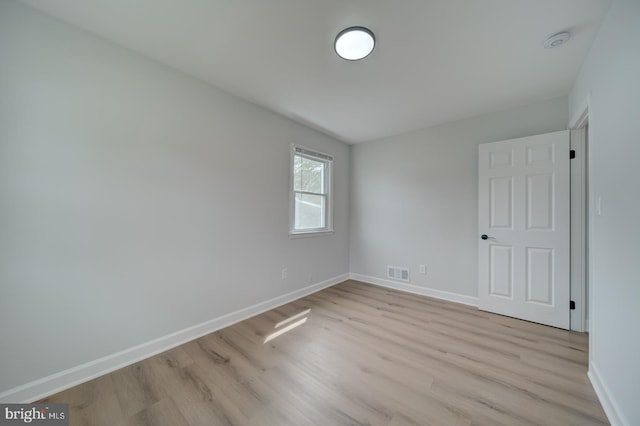 6802 Elbrook Rd, Lanham, MD 20706 - unfurnished room with baseboards, light wood-style flooring, and visible vents