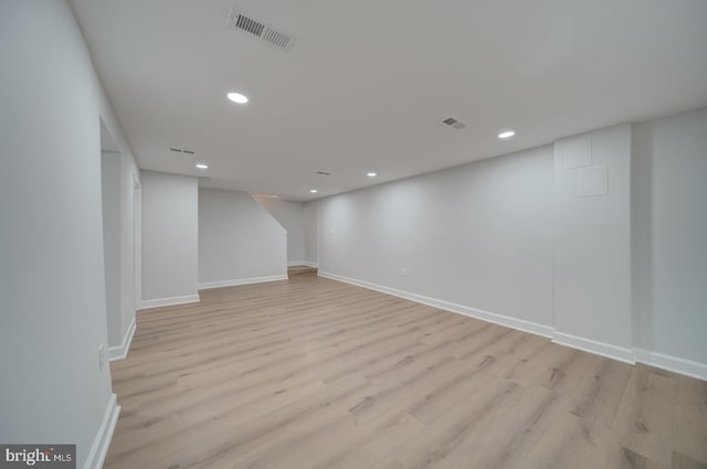 6802 Elbrook Rd, Lanham, MD 20706 - finished basement featuring recessed lighting, light wood finished floors, and visible vents