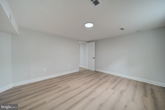 6802 Elbrook Rd, Lanham, MD 20706 - empty room with baseboards, visible vents, and wood finished floors