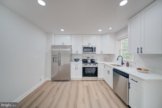 6802 Elbrook Rd, Lanham, MD 20706 - kitchen with light wood-style flooring, recessed lighting, visible vents, a sink, and stainless steel appliances