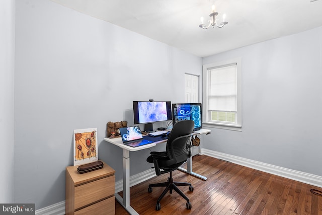 office with wood finished floors, baseboards, and a chandelier