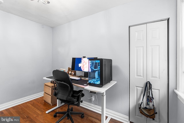 home office with wood finished floors and baseboards