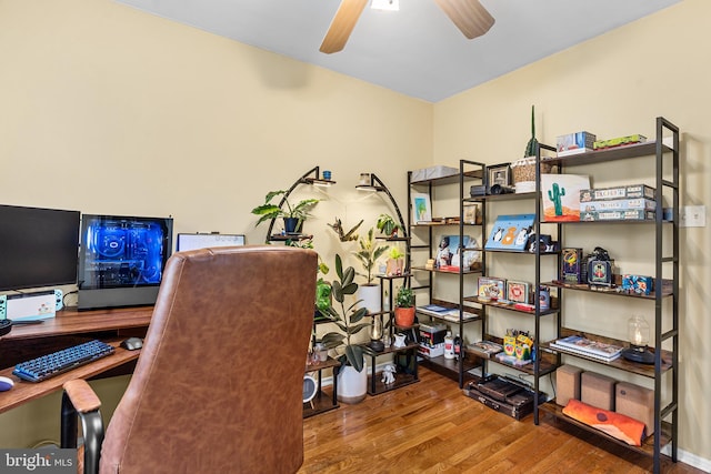 office area featuring wood finished floors and a ceiling fan
