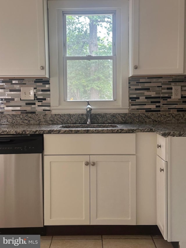 15213 Michigan Rd, Woodbridge, VA 22191 - kitchen with dishwasher, a sink, white cabinets, and tasteful backsplash