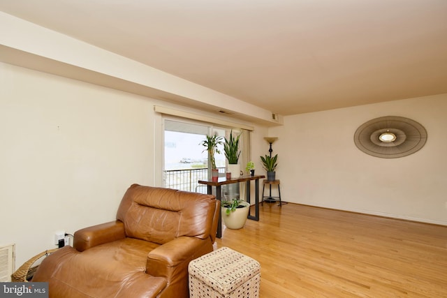 2845 Denver St SE Unit 204, Washington, DC 20020 - sitting room featuring light wood-type flooring and visible vents
