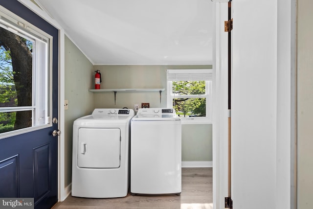 166 Meredith Ave, Bryn Mawr, PA 19010 - laundry room with baseboards, ornamental molding, separate washer and dryer, wood finished floors, and laundry area