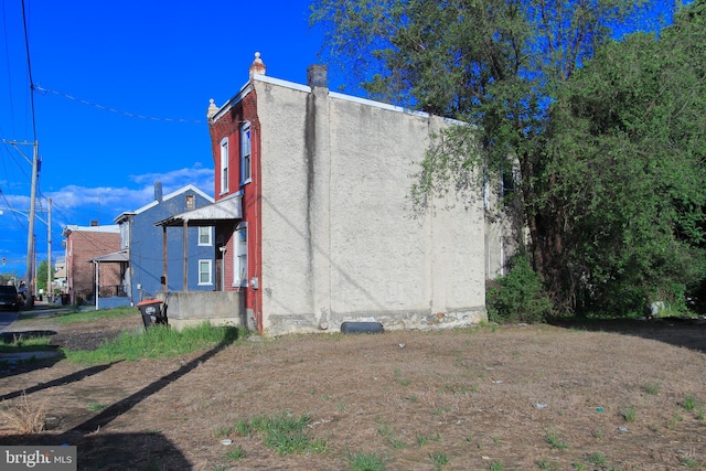 view of property exterior with stucco siding