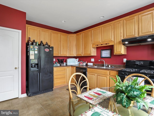 104 Panmure, Stephens City, VA 22655 - kitchen featuring black appliances, under cabinet range hood, a sink, and dark countertops