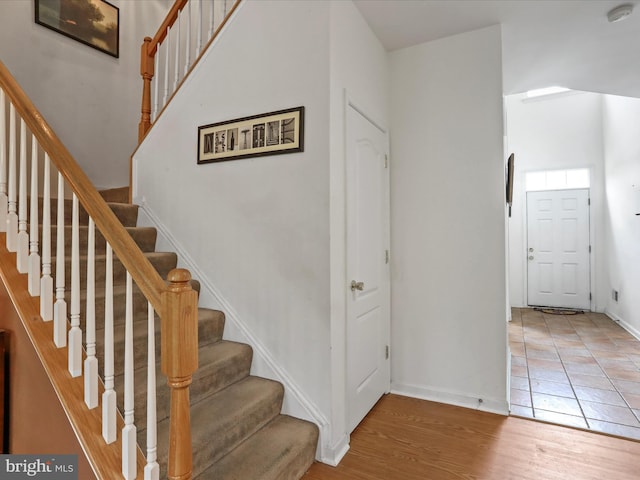 104 Panmure, Stephens City, VA 22655 - stairs with baseboards and wood finished floors