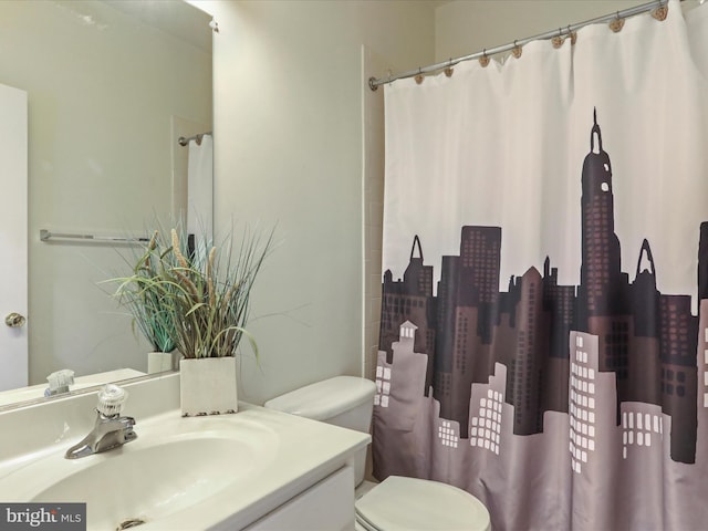 104 Panmure, Stephens City, VA 22655 - bathroom with toilet, vanity, and curtained shower