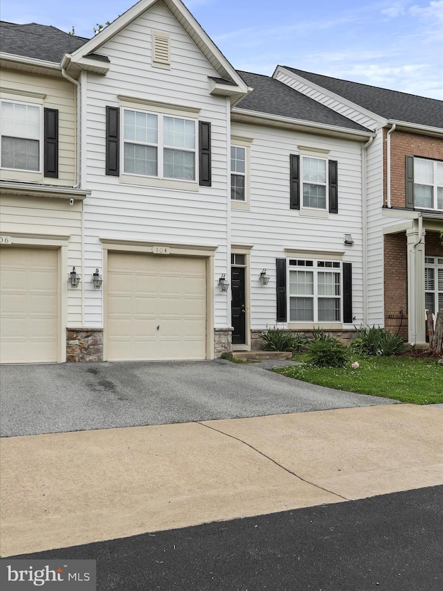 104 Panmure, Stephens City, VA 22655 - multi unit property with driveway, stone siding, and a garage