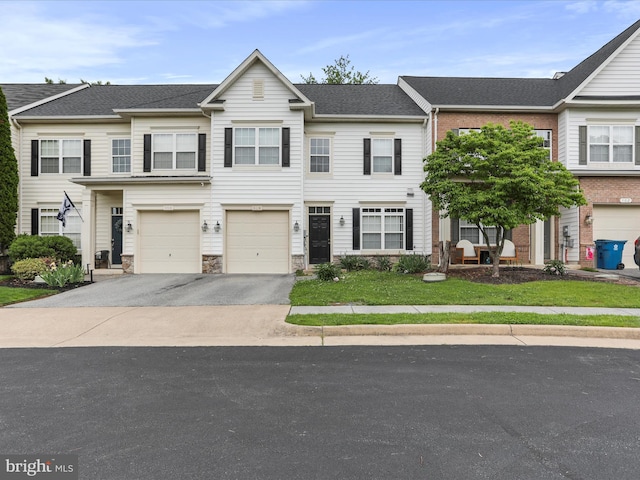 104 Panmure, Stephens City, VA 22655 - view of property with driveway, a garage, a front yard, and stone siding