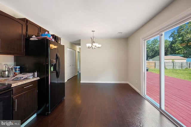 407 Bryan Point Rd, Accokeek, MD 20607 - kitchen featuring a chandelier, black refrigerator with ice dispenser, dark wood-type flooring, light countertops, and dark brown cabinets