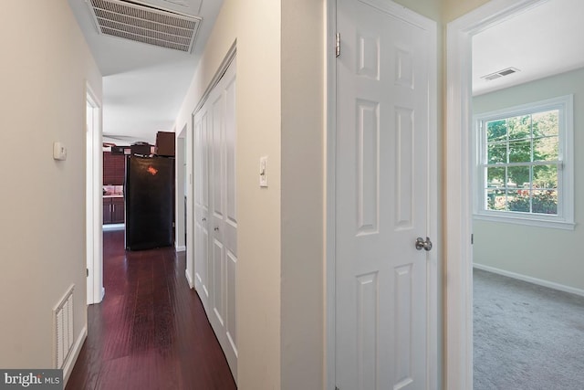 407 Bryan Point Rd, Accokeek, MD 20607 - corridor with baseboards and dark wood-style floors