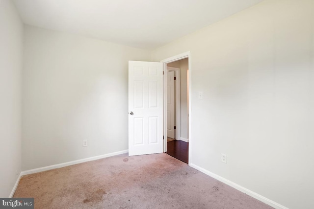 407 Bryan Point Rd, Accokeek, MD 20607 - carpeted spare room with baseboards