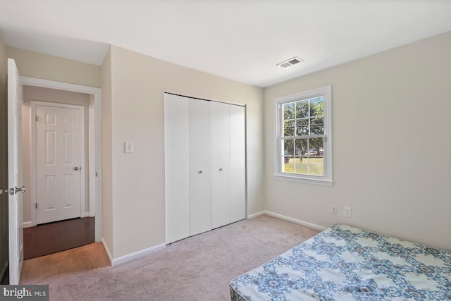 407 Bryan Point Rd, Accokeek, MD 20607 - carpeted bedroom with baseboards and a closet