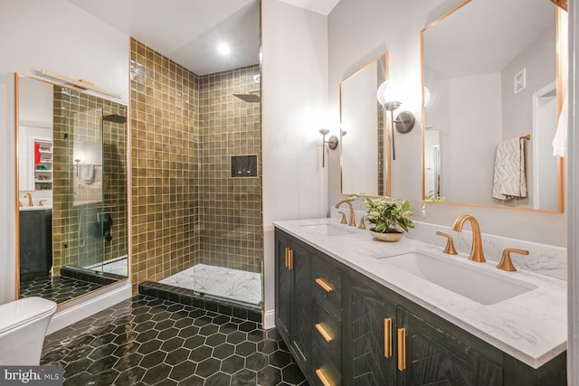 502 King Farm Blvd Unit 202, Rockville, MD 20850 - full bath with a sink, double vanity, toilet, and a stall shower