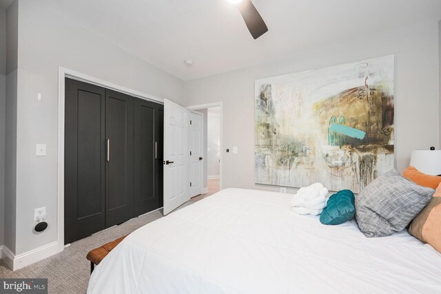 502 King Farm Blvd Unit 202, Rockville, MD 20850 - bedroom featuring carpet, baseboards, a closet, and a ceiling fan
