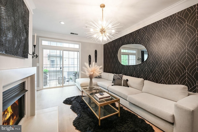 502 King Farm Blvd Unit 202, Rockville, MD 20850 - living room featuring an inviting chandelier, crown molding, visible vents, and an accent wall