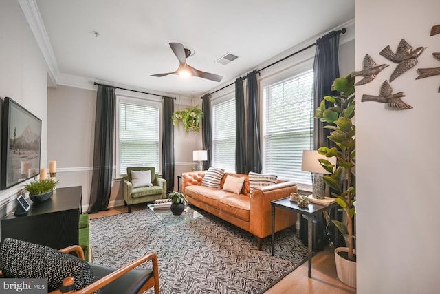 502 King Farm Blvd Unit 202, Rockville, MD 20850 - living area featuring crown molding, a healthy amount of sunlight, visible vents, and wood finished floors
