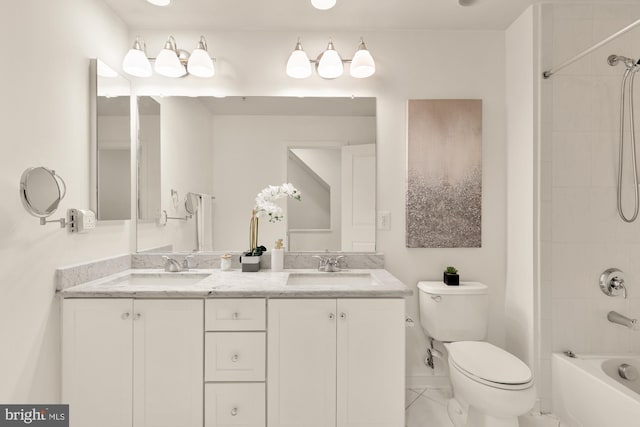 906 3rd St SE, Washington, DC 20003 - bathroom with toilet, double vanity,  shower combination, tile patterned floors, and baseboards