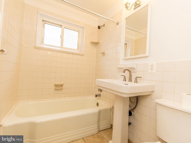 6215 Seminole Pl, College Park, MD 20740 - bathroom with shower / tub combination, tile walls, and tile patterned flooring