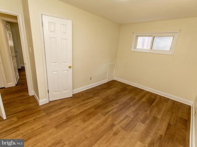 6215 Seminole Pl, College Park, MD 20740 - unfurnished bedroom with baseboards and wood finished floors