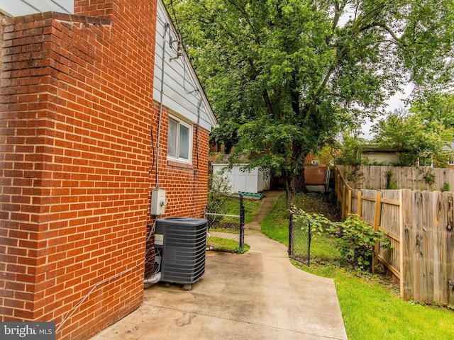 6215 Seminole Pl, College Park, MD 20740 - view of yard with central AC unit and a patio area