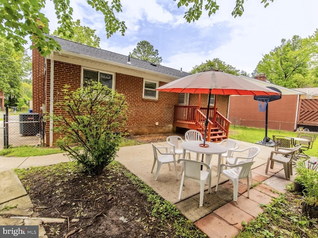 6215 Seminole Pl, College Park, MD 20740 - view of patio / terrace with central air condition unit, a deck, and outdoor dining area