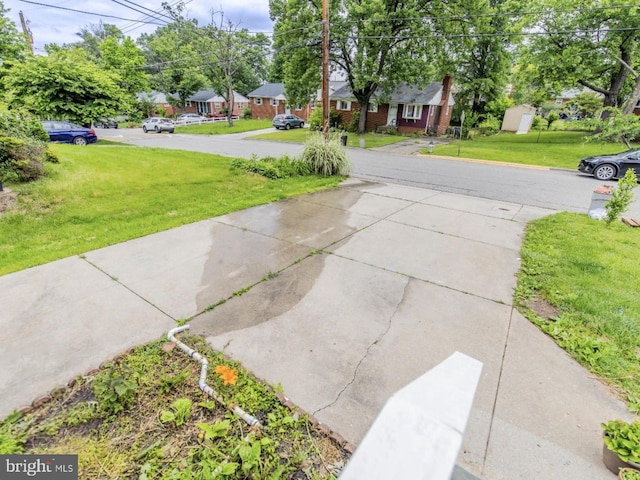 6215 Seminole Pl, College Park, MD 20740 - view of concrete driveway with a residential view