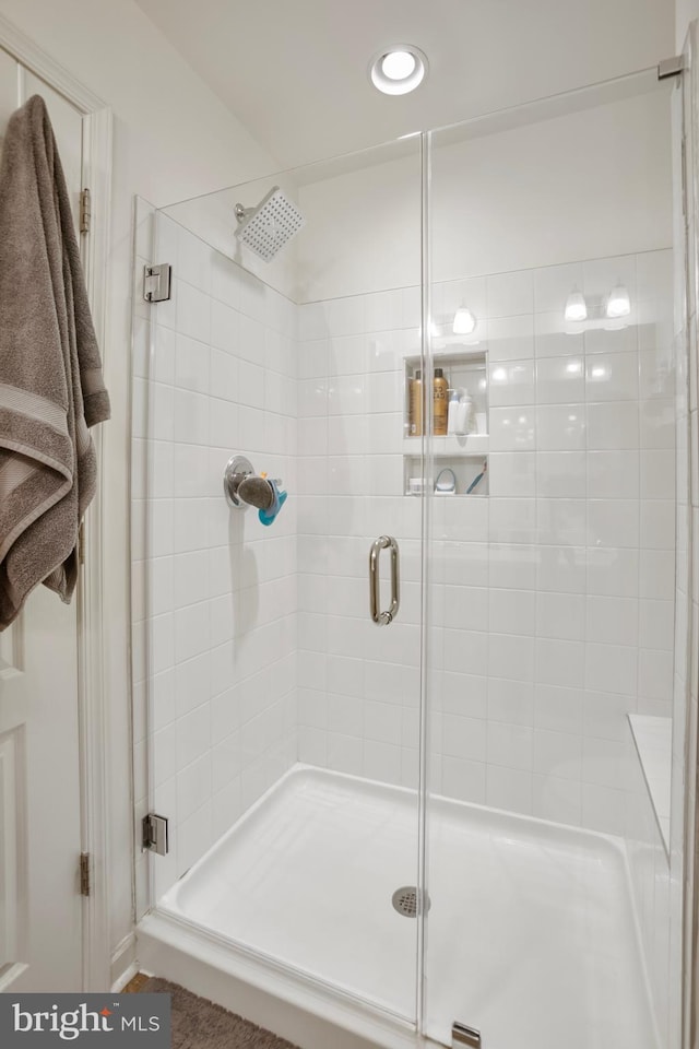 bathroom featuring a stall shower