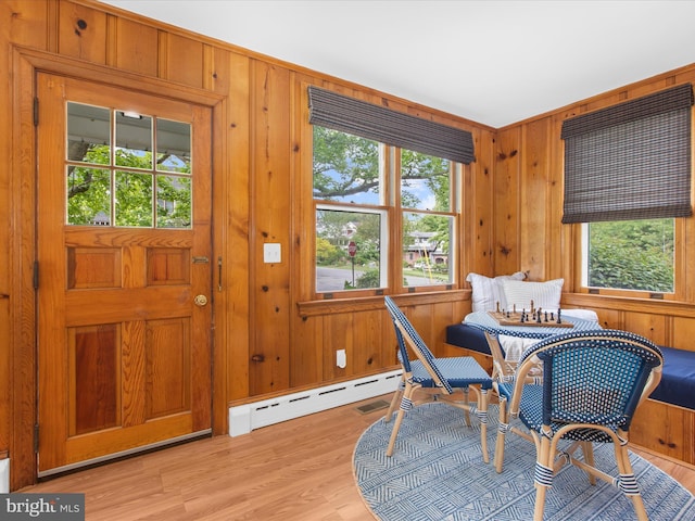 206 Shiley St, Annapolis, MD 21401 - office with a baseboard heating unit, plenty of natural light, wooden walls, and light wood finished floors