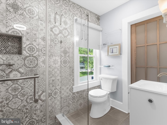 206 Shiley St, Annapolis, MD 21401 - full bathroom featuring toilet, vanity, tile patterned flooring, and a shower stall