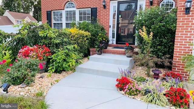 5971 Schooner Cir, King George, VA 22485 - doorway to property with brick siding