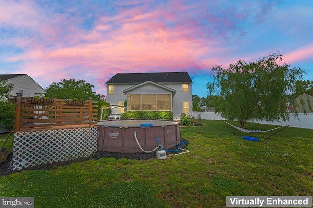 5971 Schooner Cir, King George, VA 22485 - back of house featuring a sunroom and a deck