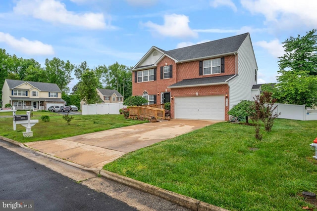 5971 Schooner Cir, King George, VA 22485 - traditional home featuring brick siding, a garage, and driveway